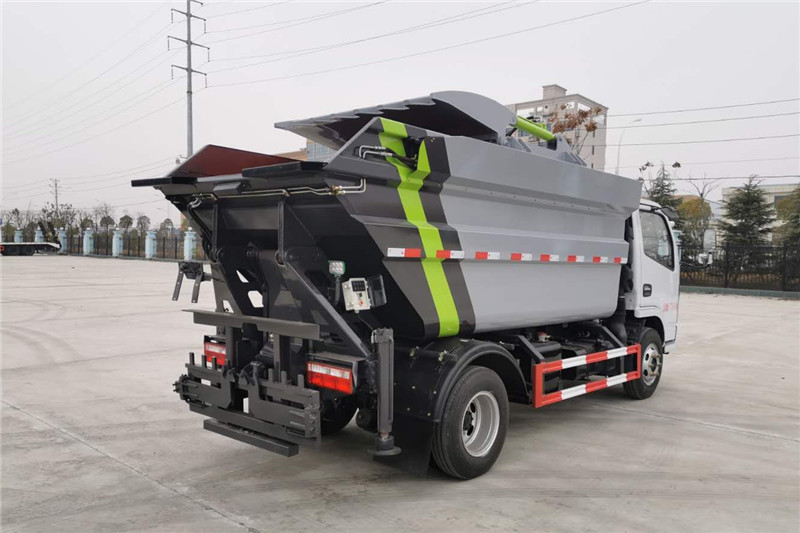 國六小多利卡7方無泄漏壓縮垃圾車{i}