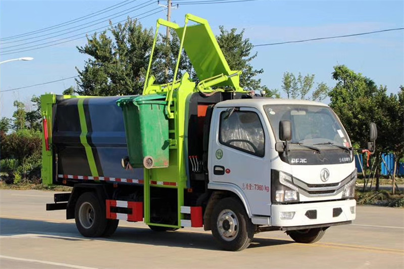 國六小多利卡6方側裝壓縮垃圾車{i}