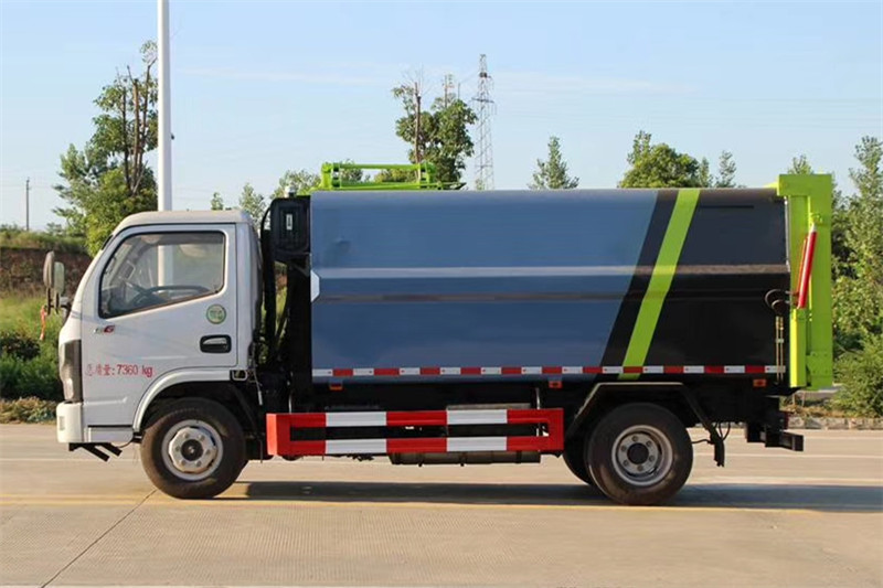 國六小多利卡6方側裝壓縮垃圾車{i}