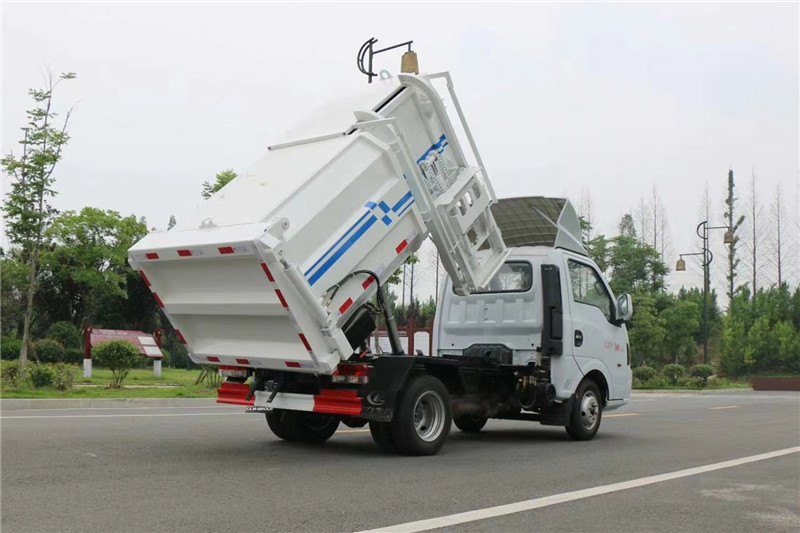 國六途逸藍牌4方側裝壓縮垃圾車{i}