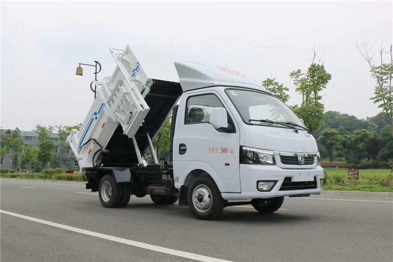 國六途逸藍牌4方側裝壓縮垃圾車{i}