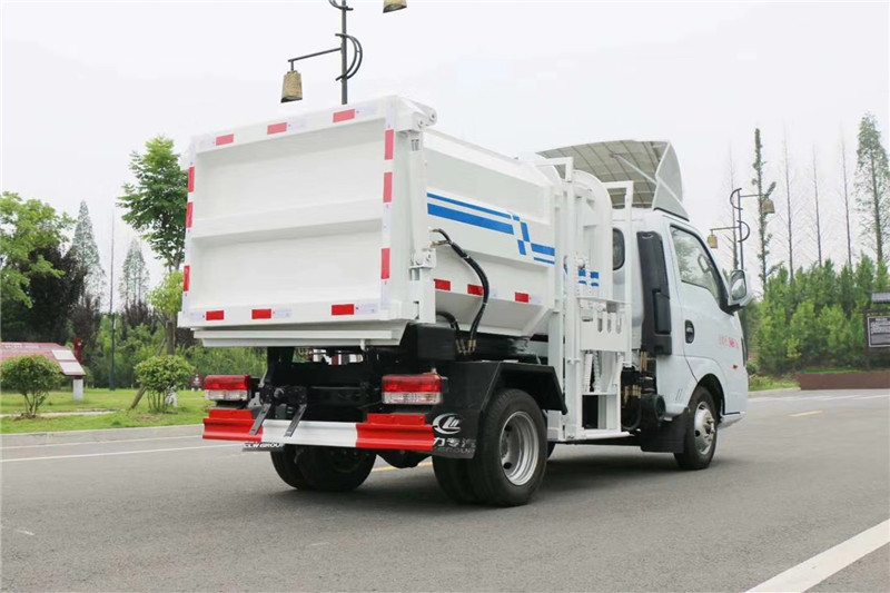 國六途逸藍牌4方側裝壓縮垃圾車{i}